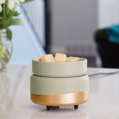 Midas 2-in-1 warmer with melted wax in the removable dish