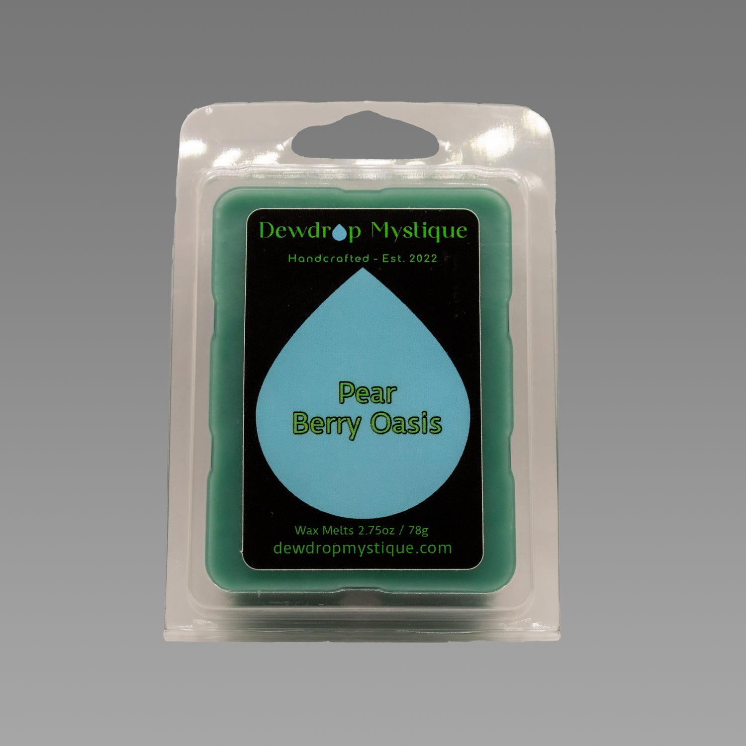 A packaged wax melt that reads 'Pear Berry Oasis'.