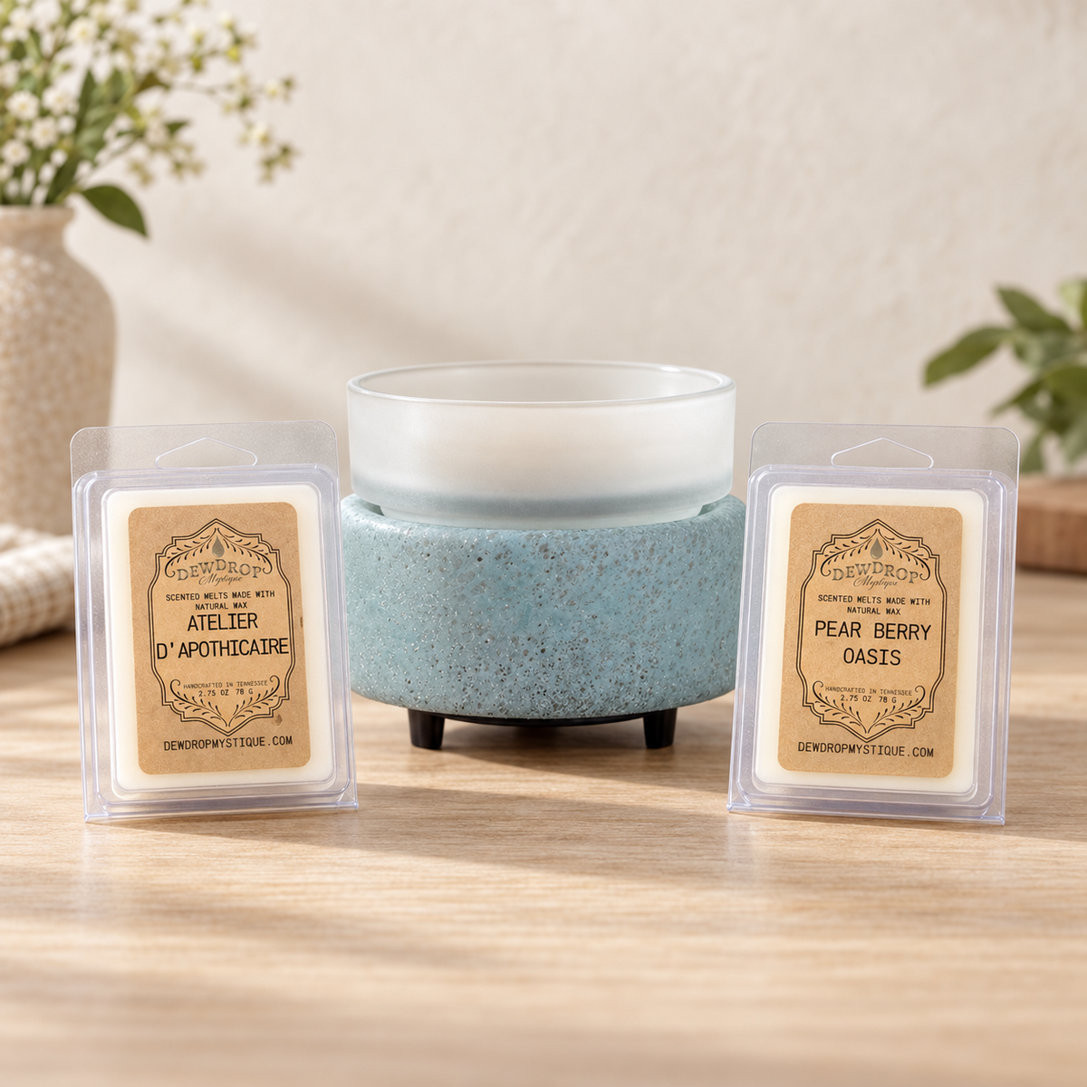 Beach Glass wax warmer with two Dewdrop Mystique wax melts
